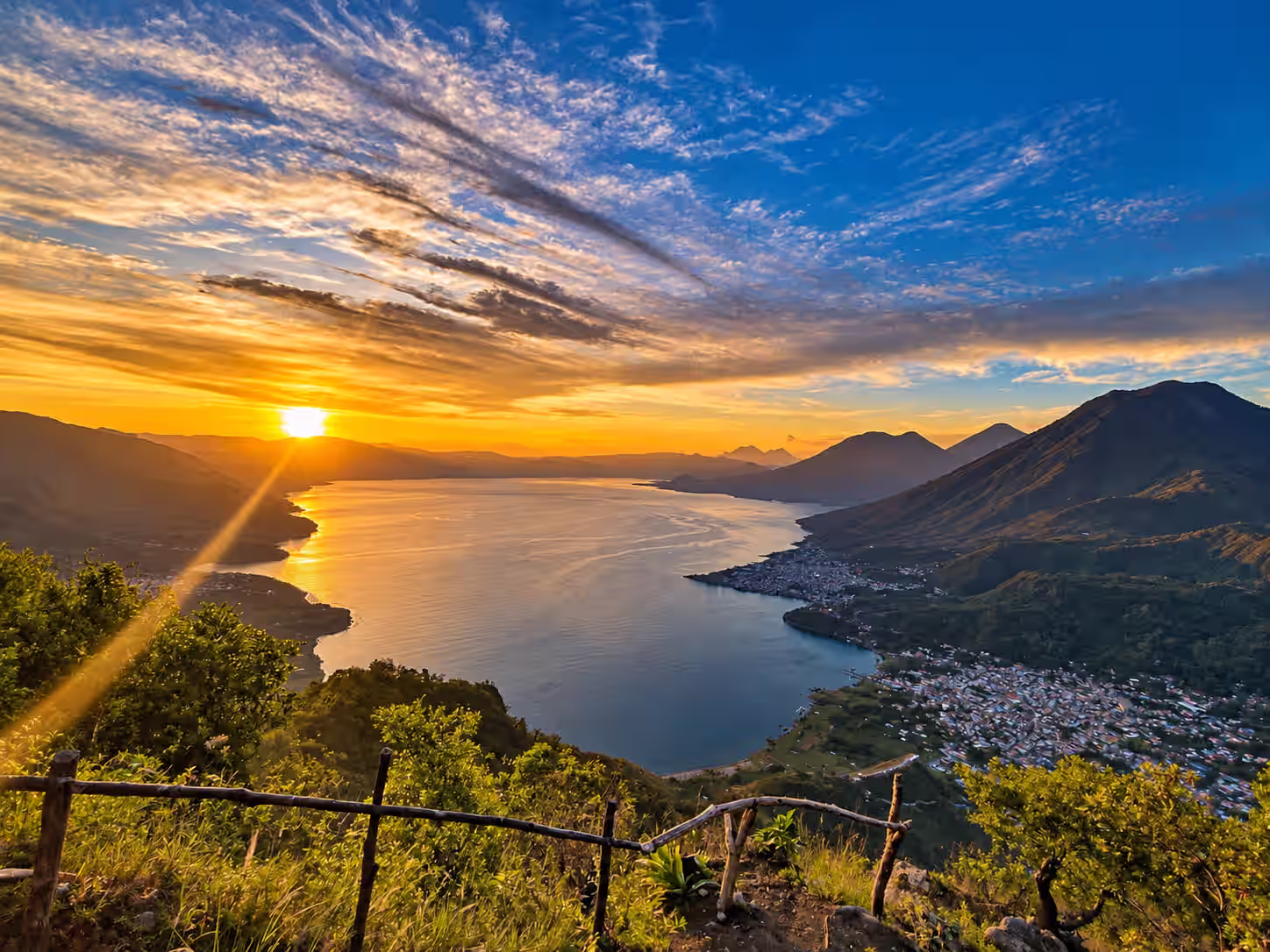 Sunrise over Lake Atitlan and its volcanoes, seen from Indian Nose